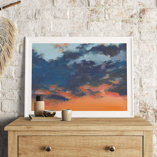Asbury Park Sunset Art Print showcasing a vibrant coastal sunset with warm golden hues and tranquil skies on archival-quality paper